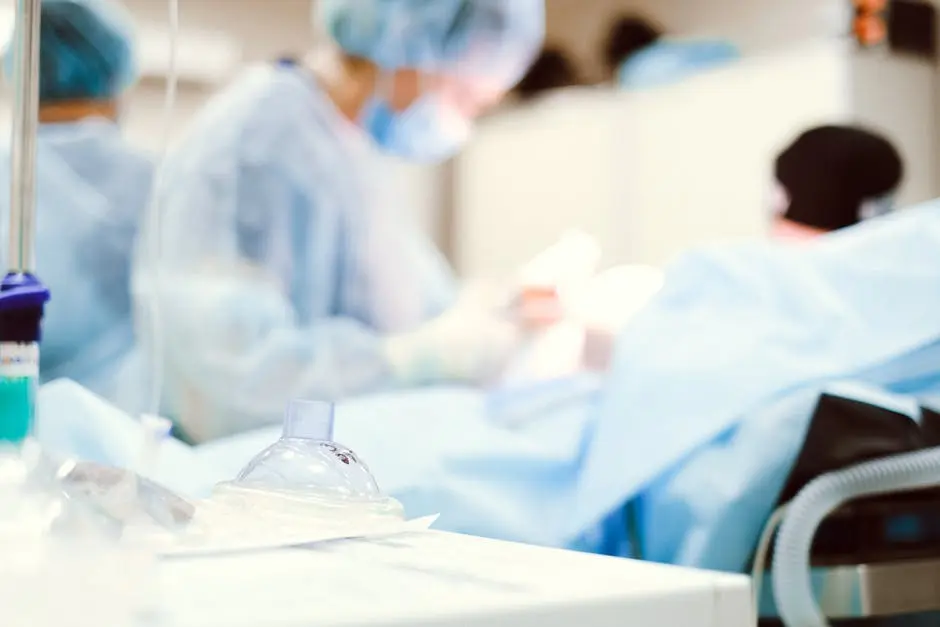 Blurred view of a surgical team in a hospital operating room.